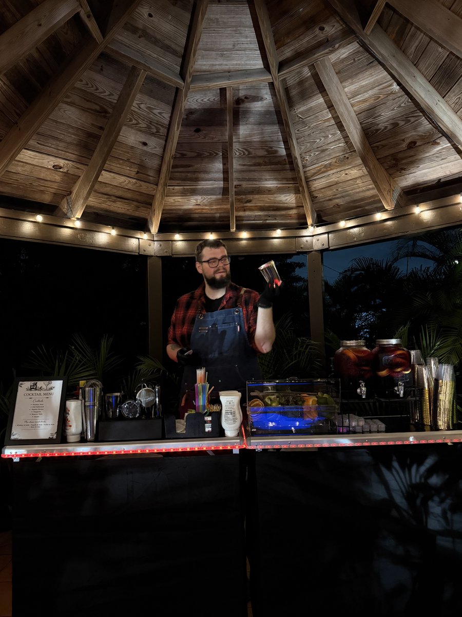 Mobile bar setup under gazebo at outdoor Miami event