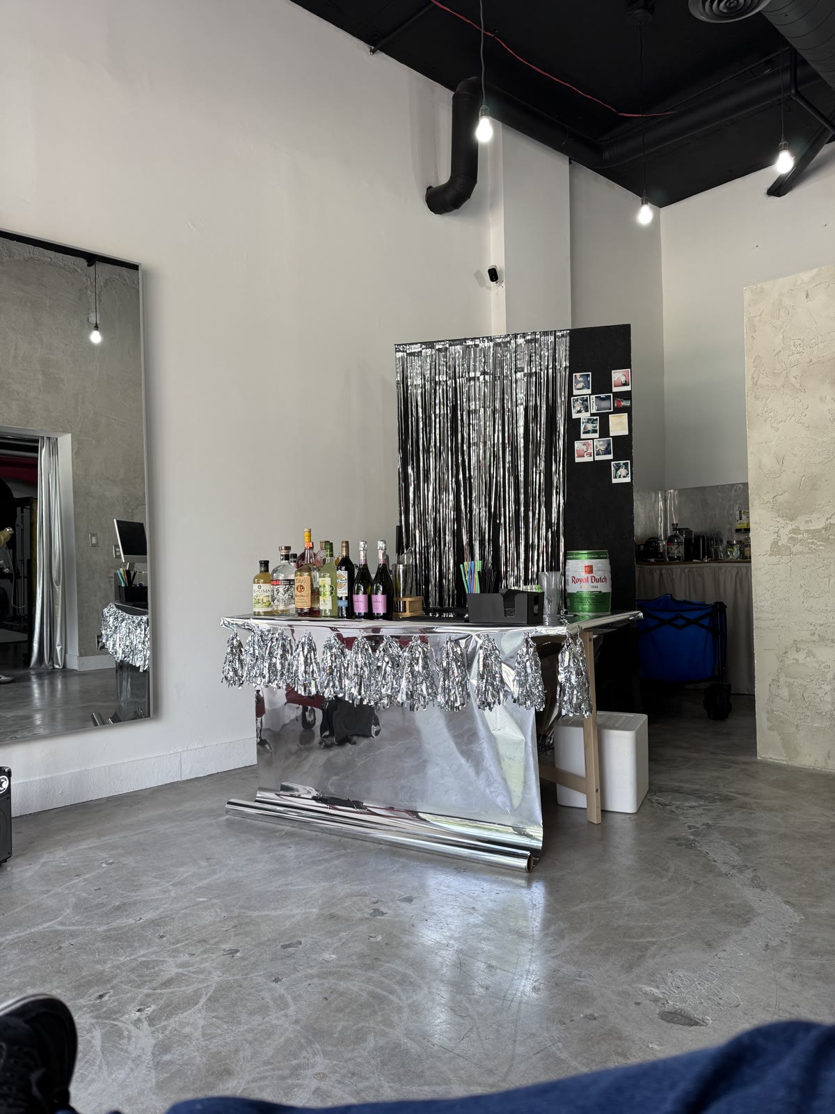 Bar setup with silver tinsel backdrop Miami event