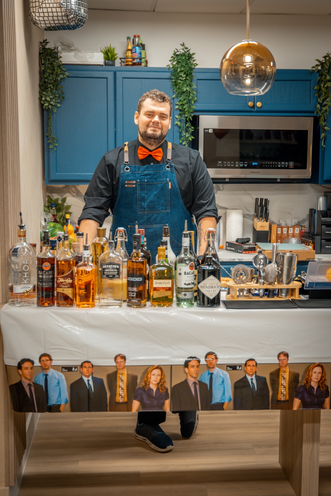 Bartender at themed house party Miami with full bar setup