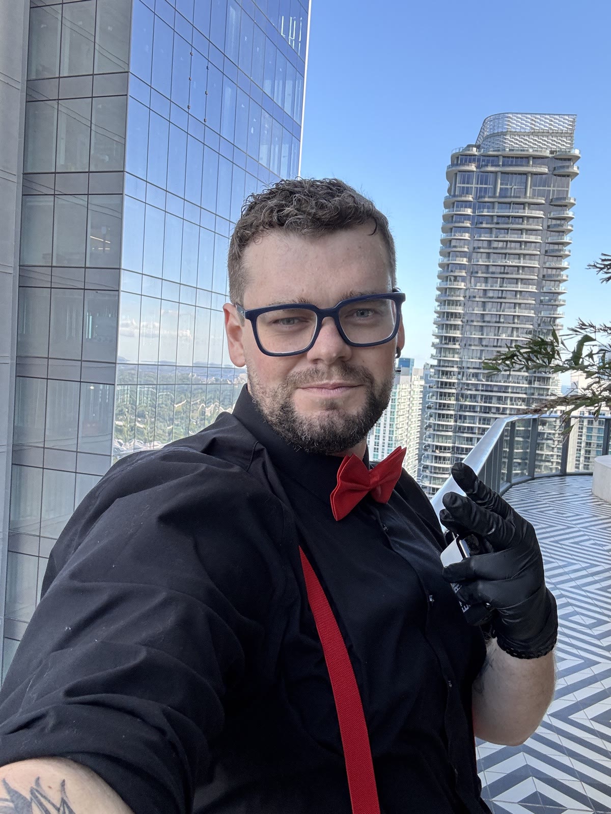 Private bartender at a Brickell rooftop party with Miami skyline