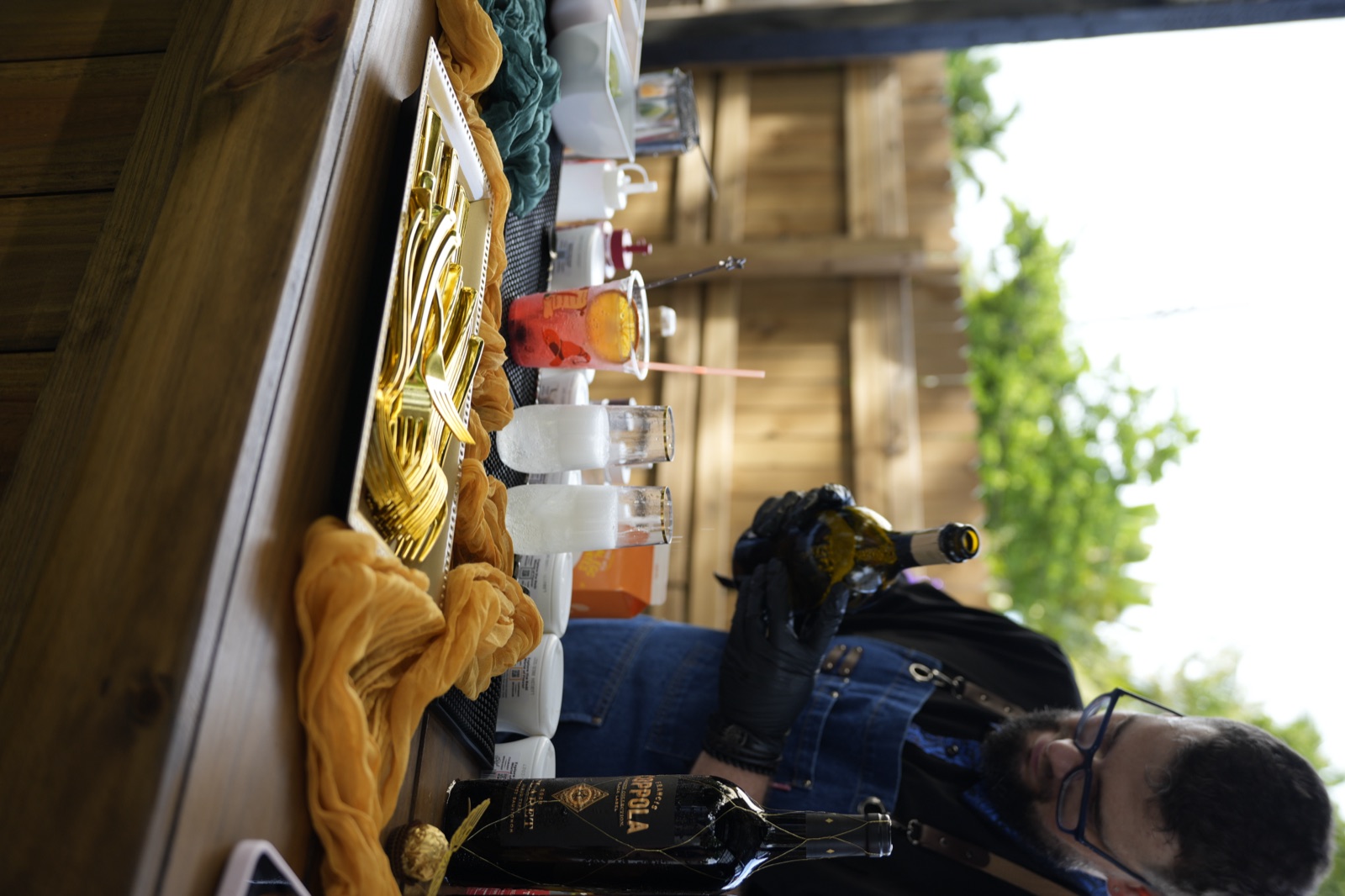 Cocktails lined up on decorated bar Miami event
