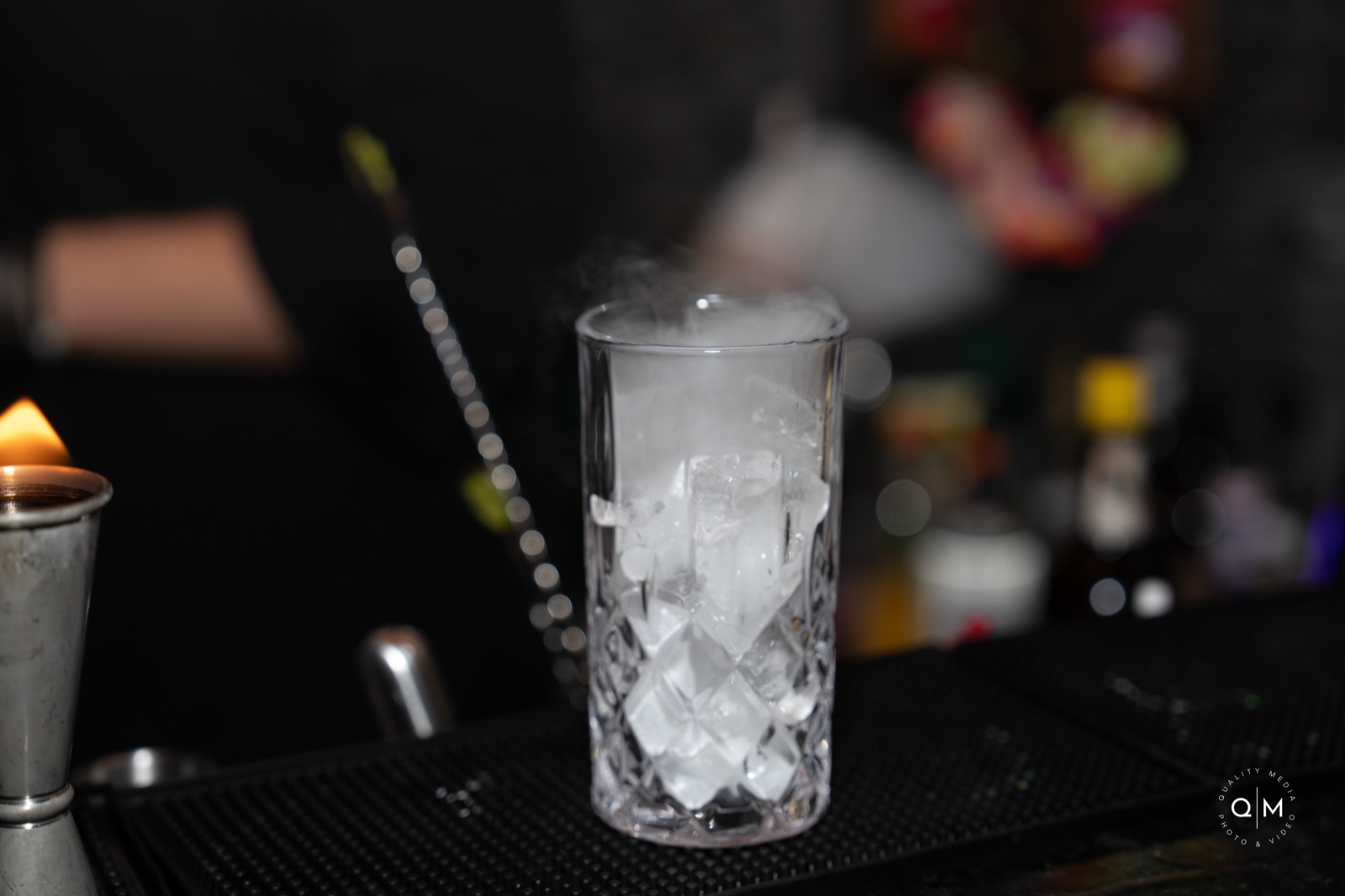 Dry ice smoke in crystal glass Miami bartender