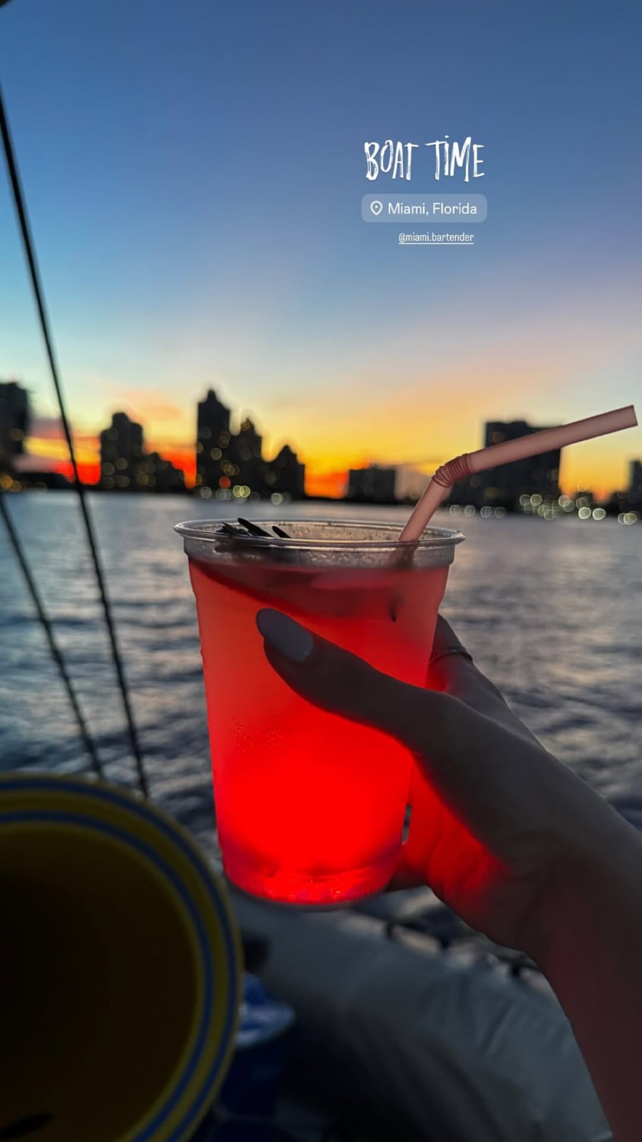 Cocktail at sunset on boat Biscayne Bay Miami